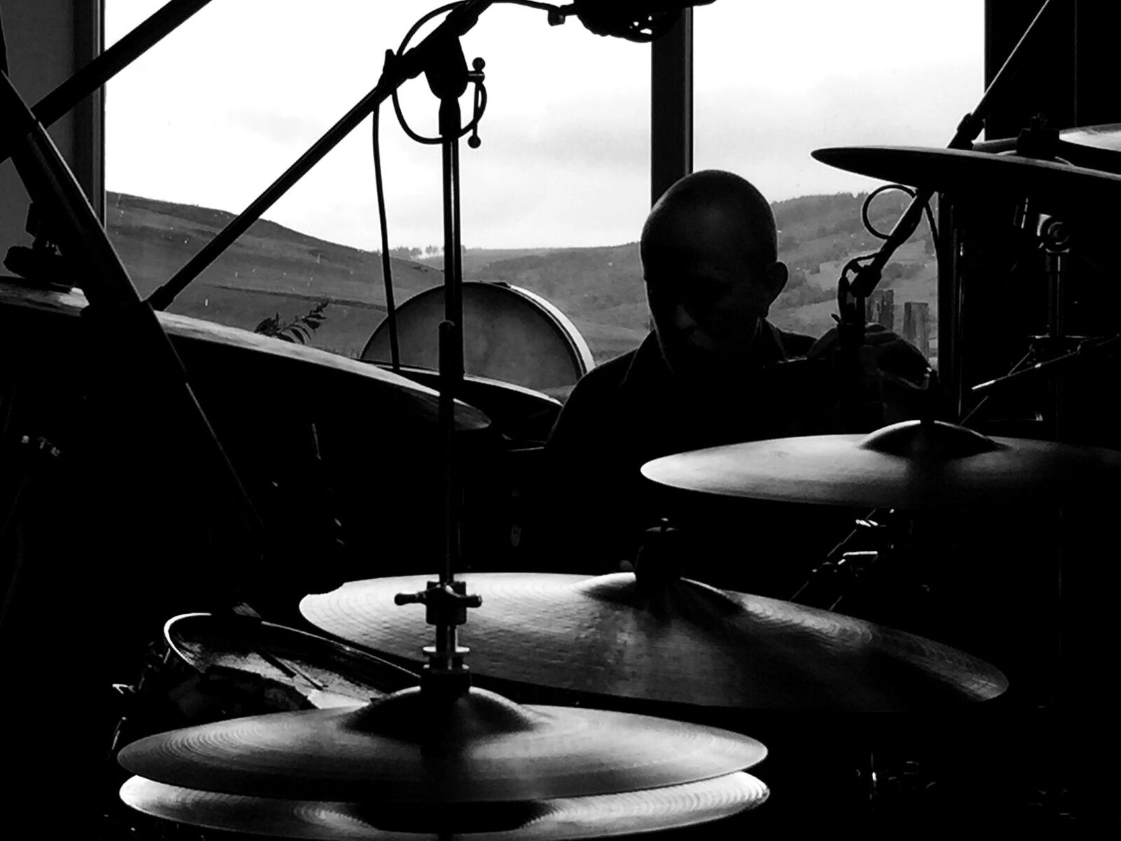Drums tracking at TPot Studio with the Perthshire glen behind the kit