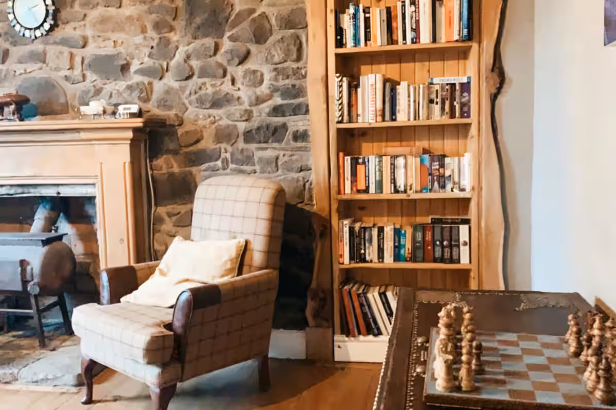 Bill's secret bookcase — the hidden door between the studio and accommodation at TPot Recording Studios